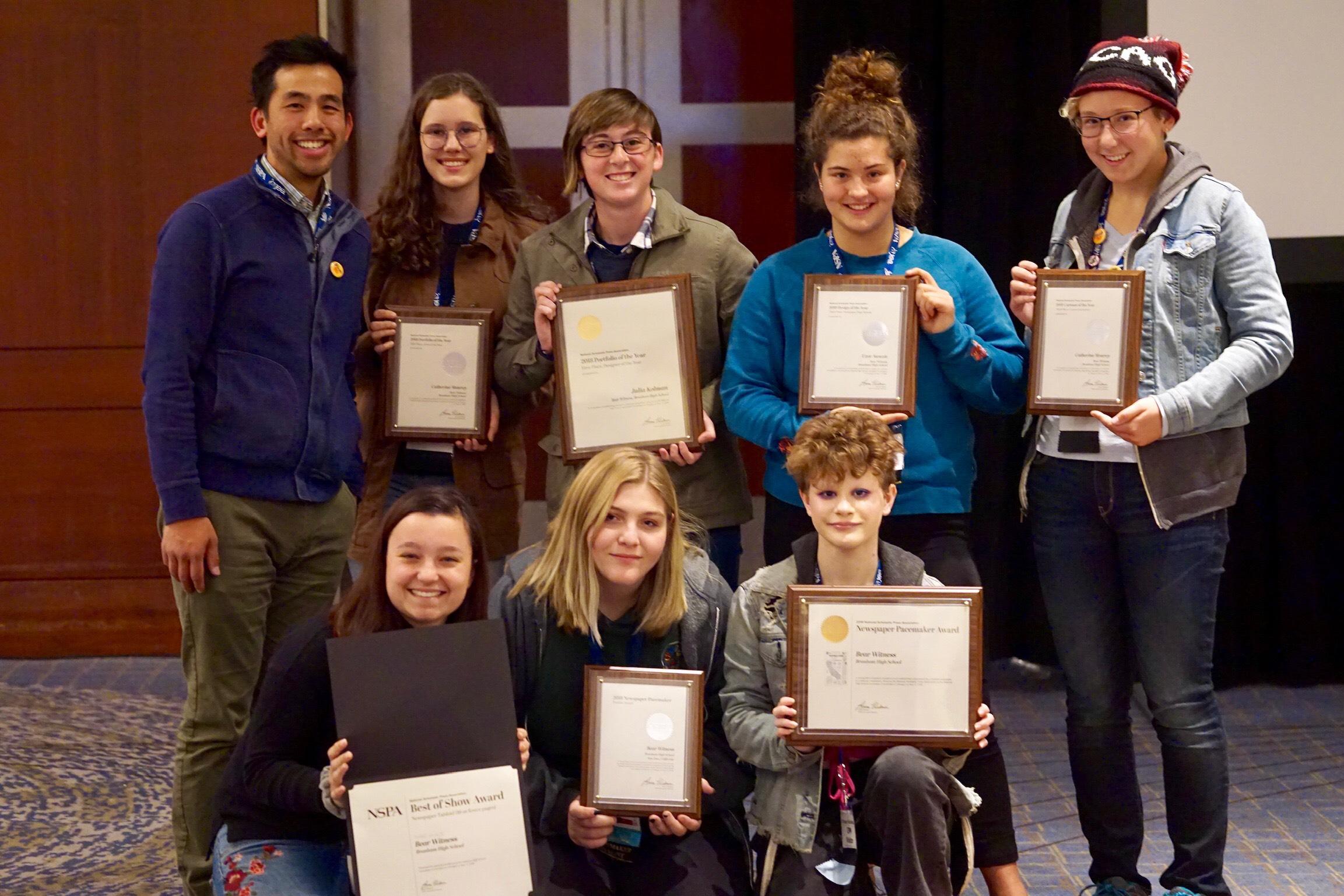Bear Witness journalists holding their Pacemaker Award